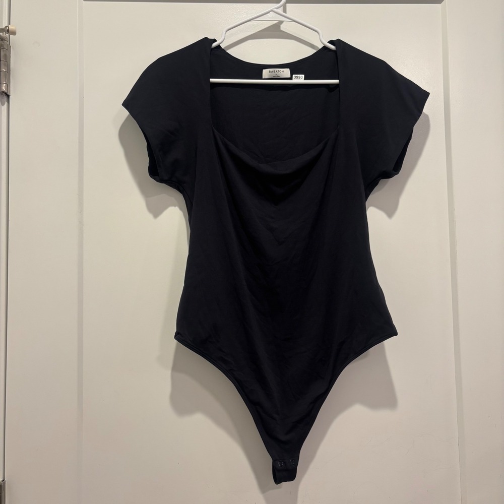 Babaton Black Short Sleeve Crew Neck Bodysuit Snap Closure Solid Minimalist